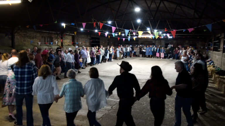 Large Ring of people at the barn dance